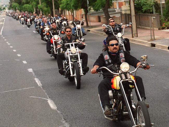 Alex Vella leads a procession at the funeral of Rebels motor cycle bikie gang murder victims Hubert Western and Graham Nixon in 1999.