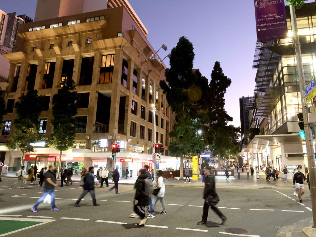 Looking south along the Queen Street Mall from the Edward St intersection, the night before the mall’s 40th anniversary. Picture: Steve Pohlner