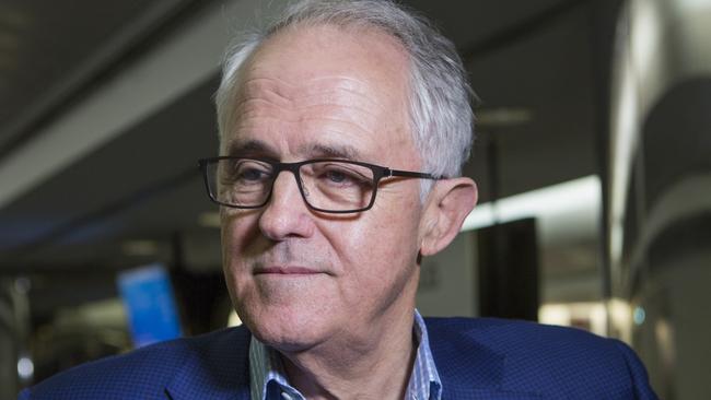 *****EXCLUSIVE PREMIUM LOCKED CONTENT - THE AUSTRALIAN and News.com.au OUT***** Former Australian Prime Minister, Malcolm Turnbull speaks to the media in the baggage claim area at New York's LaGuardia Airport as he arrived for an extended holiday with his wife, Lucy. Queens, New York, USA. Sunday, September 2nd, 2018. (Angus Mordant for NewsCorp Australia)