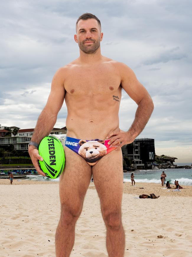 NRL star James Tedesco wears Ted-style Budgy Smugglers at Bondi in promotion of Binge's new series. Photographer: Tom Parrish