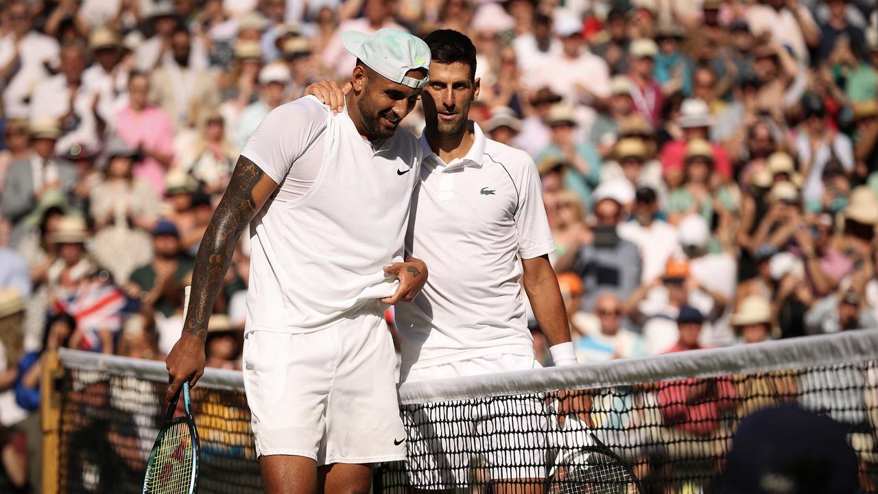 LONDON, ENGLAND - JULY 10: Winner Novak Djokovic of Serbia (L) and runner up Nick Kyrgios of Australia interact by the net following their Men's Singles Final match day fourteen of The Championships Wimbledon 2022 at All England Lawn Tennis and Croquet Club on July 10, 2022 in London, England. (Photo by Ryan Pierse/Getty Images)