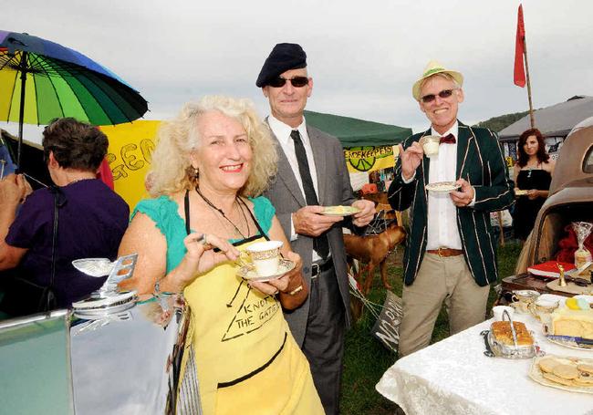 TOP NOTCH: Rosie Lee, RJ Poole of Lismore, and Ted Hoddinott of Bentley having a high tea at the Bentley CSG site with two Bentley cars on Saturday. Picture: Doug Eaton