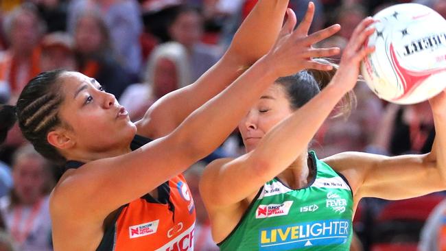 Kristiana Manu'a battles with West Coast Fever player Verity Charles in their match on Saturday.