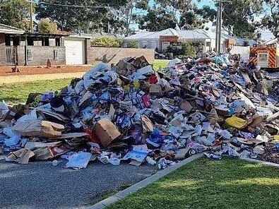 The street was littered with a huge pile of rubbish. Picture: Facebook