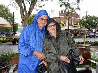 Graeme and Loretta Clothier enjoy the wet weather in Roma. Picture: Alexia Austin