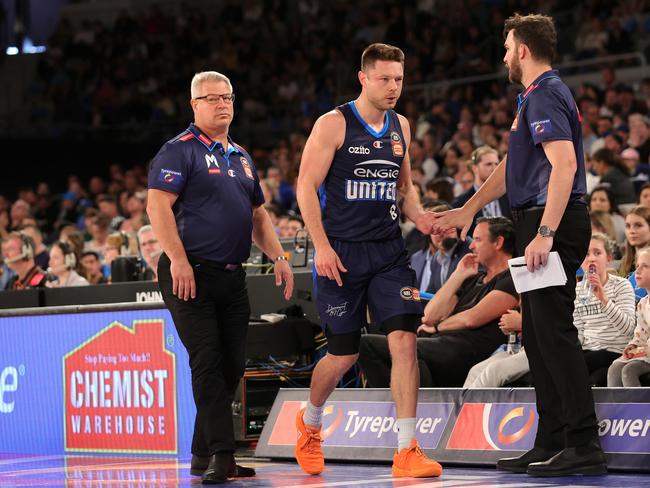 Matthew Dellavedova of United leaves the court following a collision during the round three NBL match between Melbourne United and Brisbane Bullets at John Cain Arena. Photo: Kelly Defina/Getty Images.