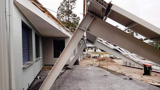 The collapsed spectator terrace roof at Angaston Football Club, which has resulted in a $70,000 workplace safety fine for the two firms that designed it. Picture: SafeWork SA