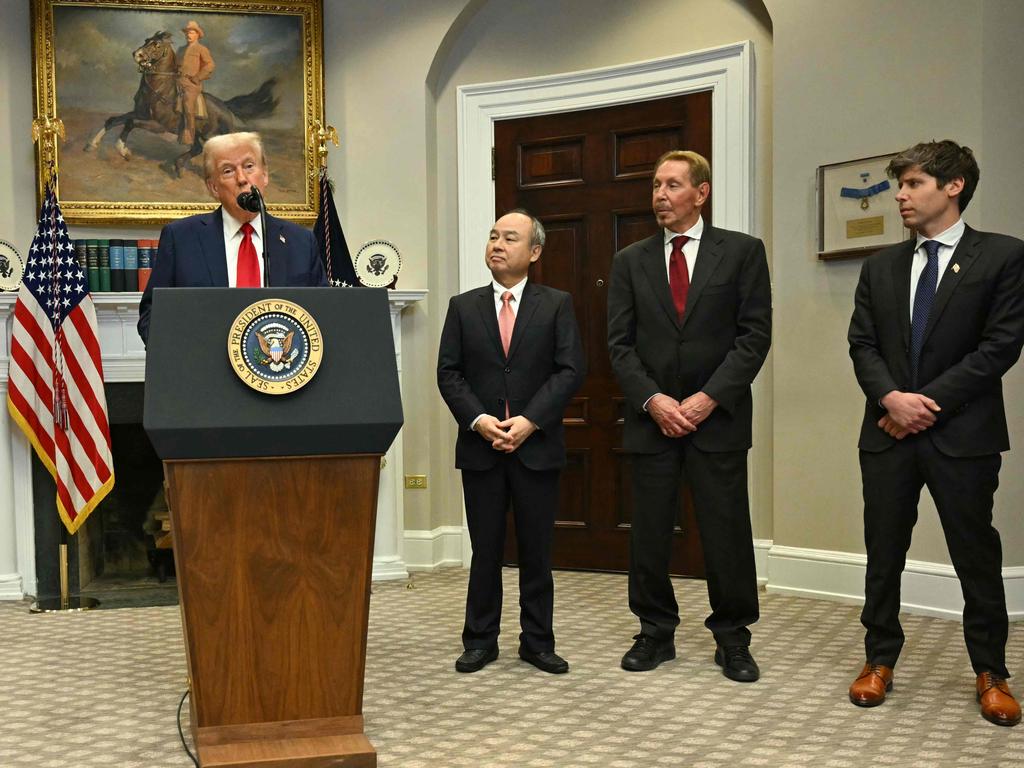 US President Donald Trump speaks in the Roosevelt Room flanked by tech bosses Masayoshi Son, Larry Ellison and Sam Altman. Picture: AFP