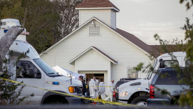 Investigators work at the scene of the First Baptist church shooting where 26 people were killed. Picture: Jay Janner/Austin American-Statesman