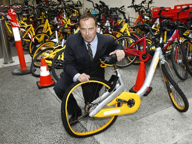 Waverley Mayor John Wakefield with defective bikes collected by staff on Monday morning. Picture: John Appleyard