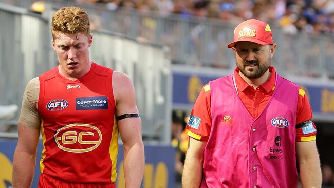 Matt Rowell leaves the field after injuring his knee early in the match against West Coast. Picture: Will Russell/AFL Photos via Getty Images