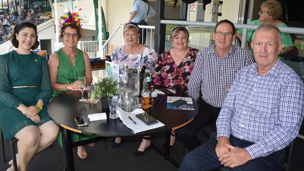 Alice Galea, Vicki Doolan, Hazel Reynolds, Amanda and Todd McDonald, and Greg Reynolds at the St Patrick’s Day races in Rockhampton on March 12, 2022. Picture: Aden Stokes