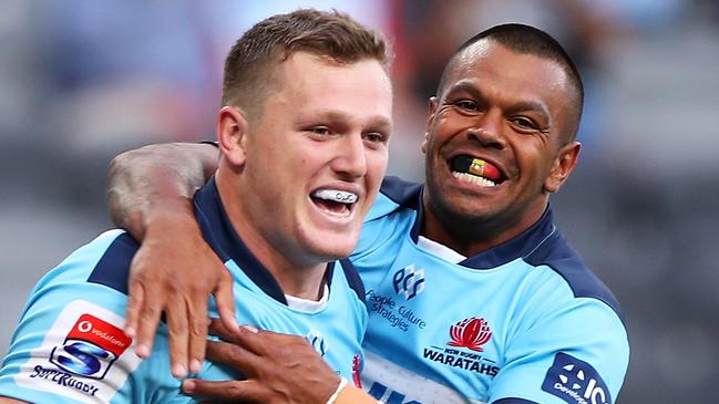 SYDNEY, AUSTRALIA - FEBRUARY 28: Angus Bell and Kurtley Beale of the Waratahs celebrate Bell scoring a try during the round five Super Rugby match between the Waratahs and the Lions at Bankwest Stadium on February 28, 2020 in Sydney, Australia. (Photo by Mark Kolbe/Getty Images)