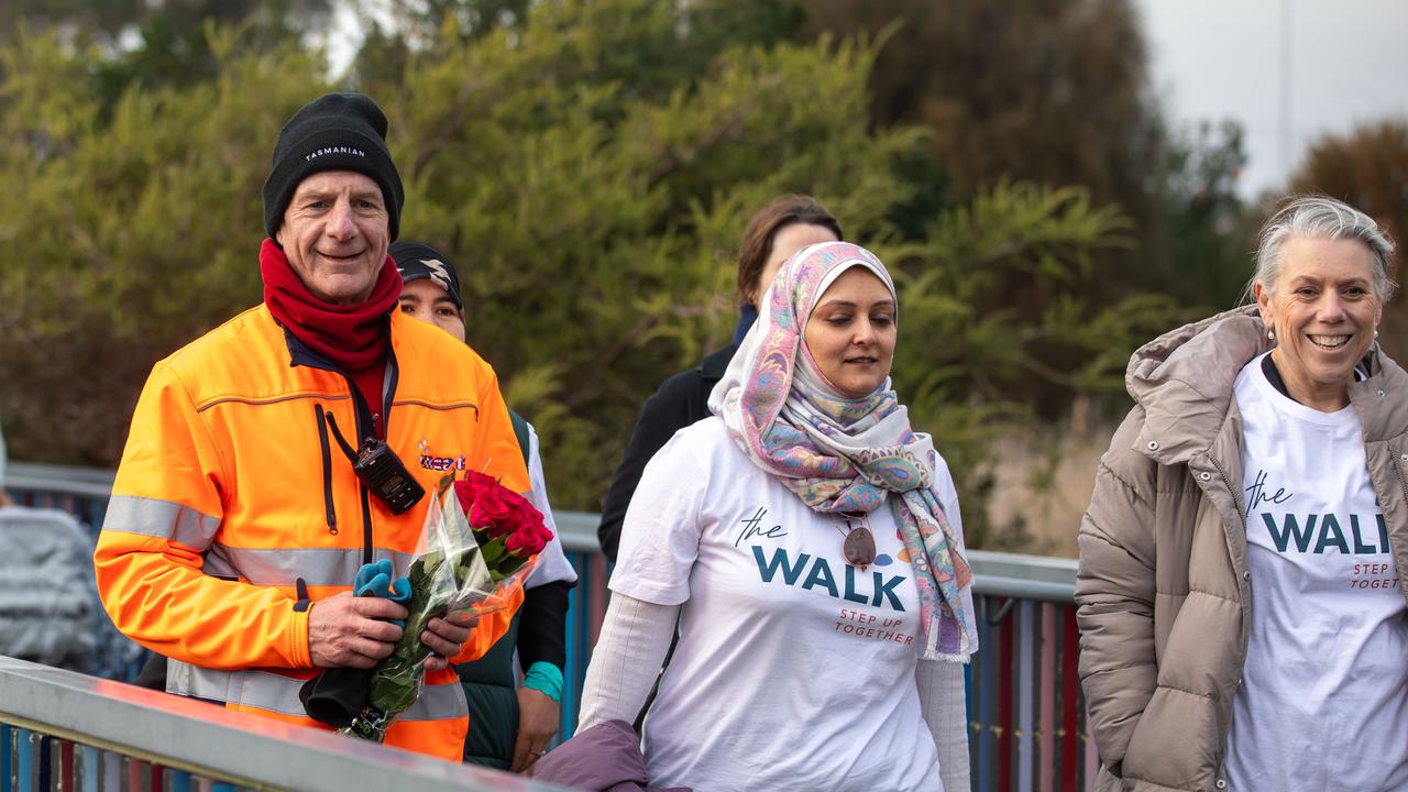 Former Tasmanian Premier Peter Gutwein completes the walk step up together at Montrose Foreshore. Peter Gutwein, Amin Jafri, and MRC Tas CEO Gillian Long. Picture: Linda Higginson