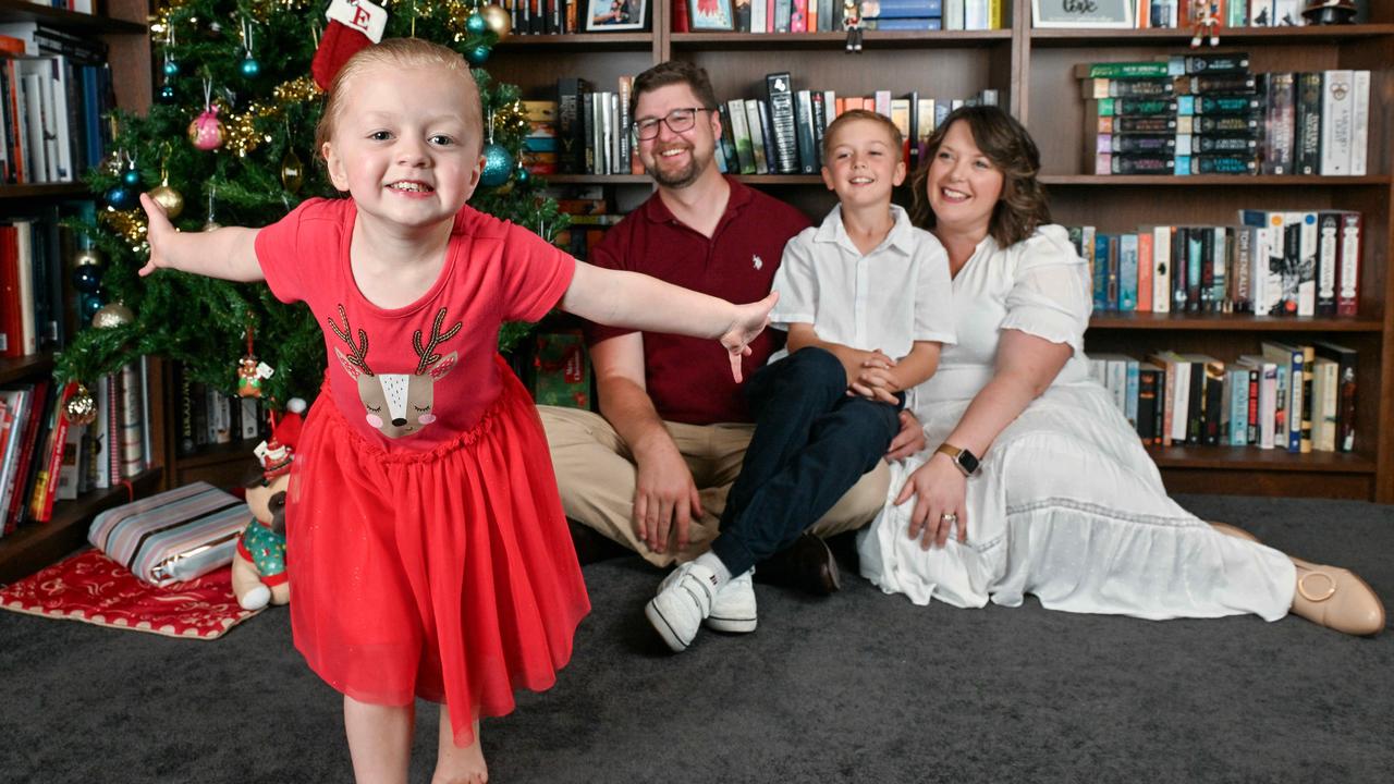 Little Evelyn, with her family at home, loves to dance and perform. Picture: Brenton Edwards