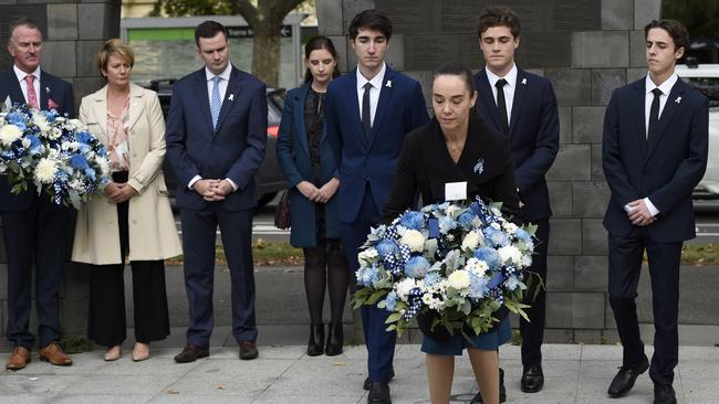 The families of the four slain Eastern Freeway officers at the Police Memorial on St Kilda Road. Picture: NCA NewsWire