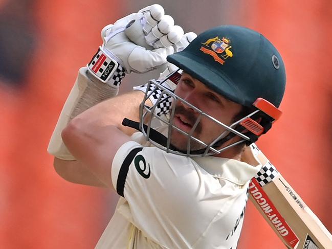 Australia's Travis Head watches the ball after playing a shot during the fifth day of the fourth and final Test cricket match between India and Australia at the Narendra Modi Stadium in Ahmedabad on March 13, 2023. (Photo by Punit PARANJPE / AFP) / ----IMAGE RESTRICTED TO EDITORIAL USE - STRICTLY NO COMMERCIAL USE-----