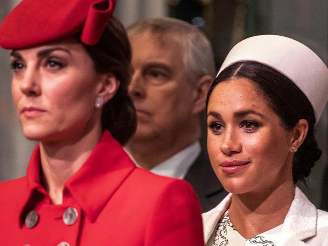 Britain's Meghan, Duchess of Sussex (R) and Britain's Catherine, Duchess of Cambridge, (L) attend the Commonwealth Day service at Westminster Abbey in London on March 11, 2019. - Britain's Queen Elizabeth II has been the Head of the Commonwealth throughout her reign. Organised by the Royal Commonwealth Society, the Service is the largest annual inter-faith gathering in the United Kingdom. (Photo by Richard Pohle / POOL / AFP)