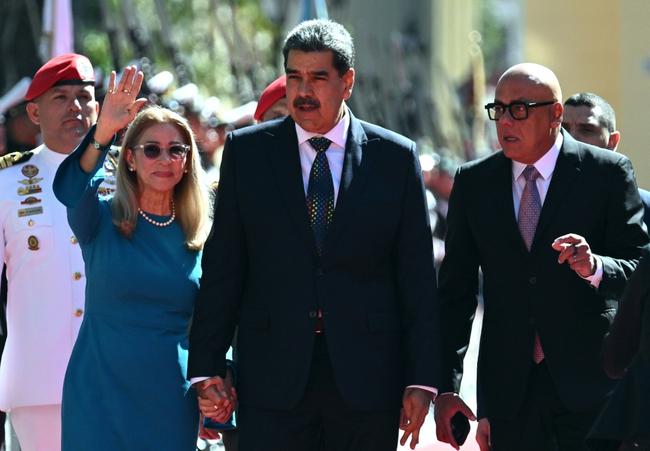 Venezuela's President Nicolas Maduro with First Lady Cilia Flores ahead of his swearing-in for a third six-year term