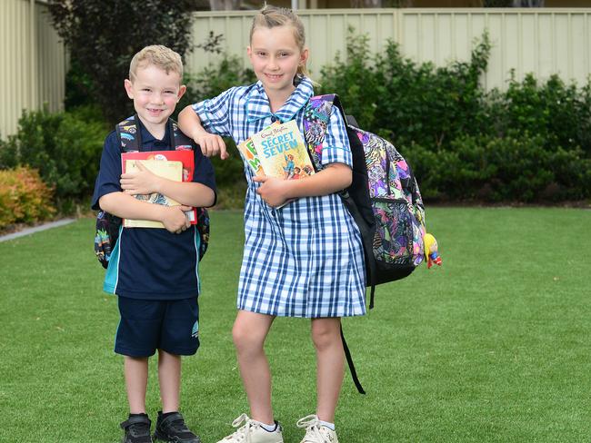 Kane, 5 and sister Mylee, 9 Henkes from Semaphore Park getting ready for the new school  year on the 21st January 2022 - Picture: Michael Marschall