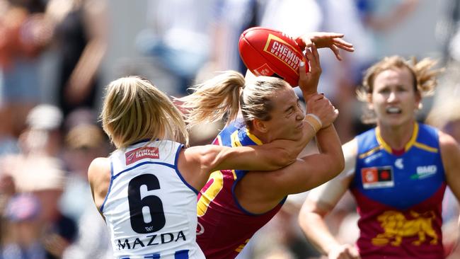 MELBOURNE, AUSTRALIA - DECEMBER 03: Natalie Grider of the Lions is tackled by Alice O'Loughlin of the Kangaroos during the 2023 AFLW Grand Final match between The North Melbourne Tasmanian Kangaroos and The Brisbane Lions at IKON Park on December 03, 2023 in Melbourne, Australia. (Photo by Michael Willson/AFL Photos via Getty Images)