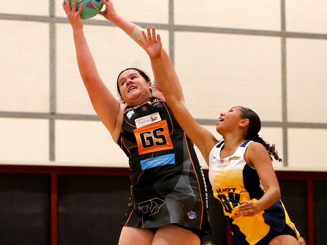 Sapphire Series netball Round 1 - Sunshine Coast Thunder Vs Tigers (black) = Tigers goal shooter Tia Crombie and thunders goal keeper Sophie Wall Nathan Saturday 22nd April 2023 Picture David Clark