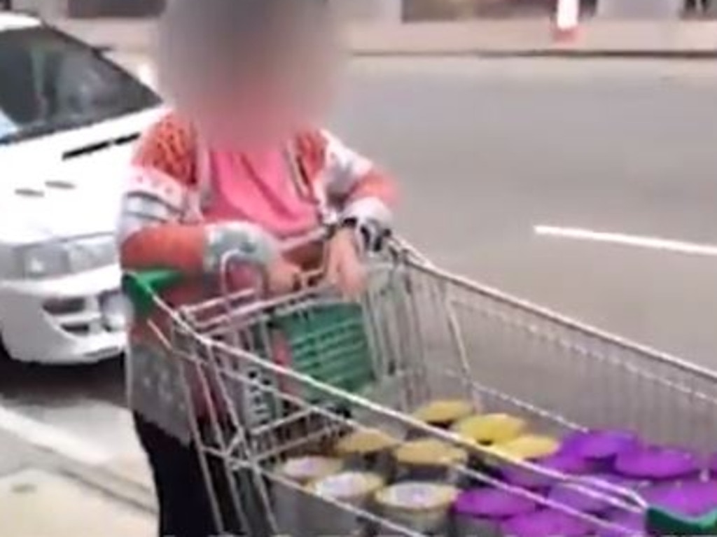 A woman received a trolley load of baby formula outside a Chinese export business in Sydney's south. Picture: 2GB
