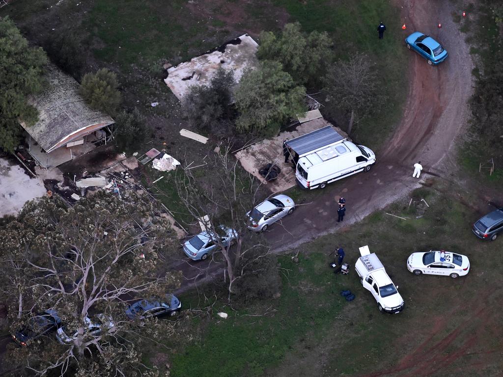 Police at the house in Hillier, in Adelaide’s north, on the day the three bodies were found. Picture: Sam Wundke/Nine News helicopter