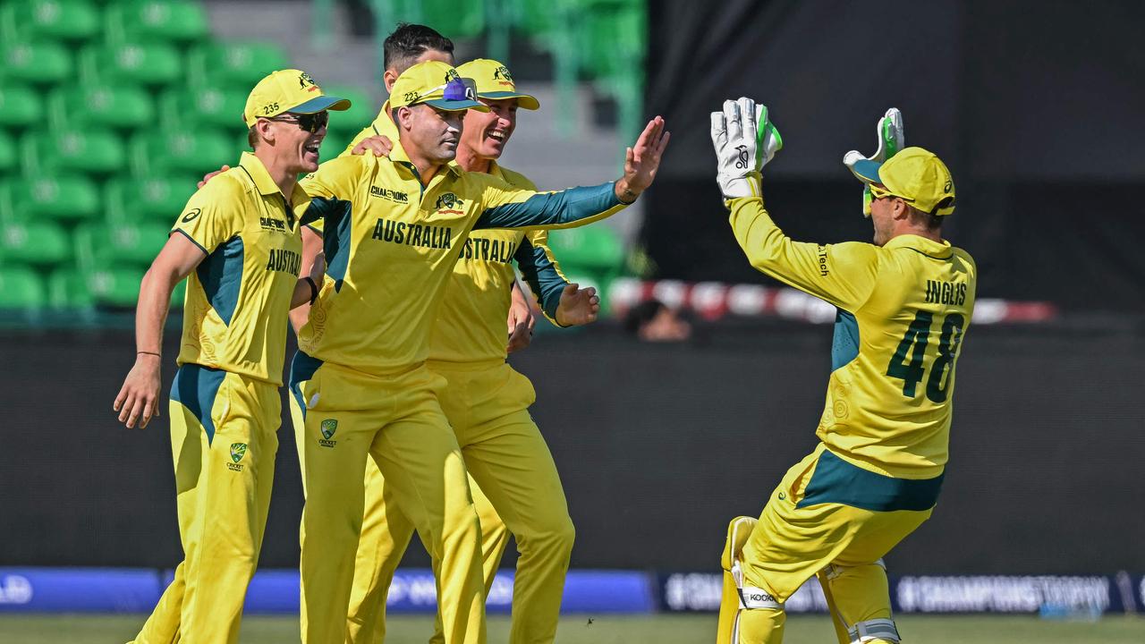 Australia's players celebrate. Photo by Aamir QURESHI / AFP.