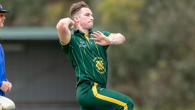 Northcote's Sam Harbinson steams in. Picture: Arj Giese