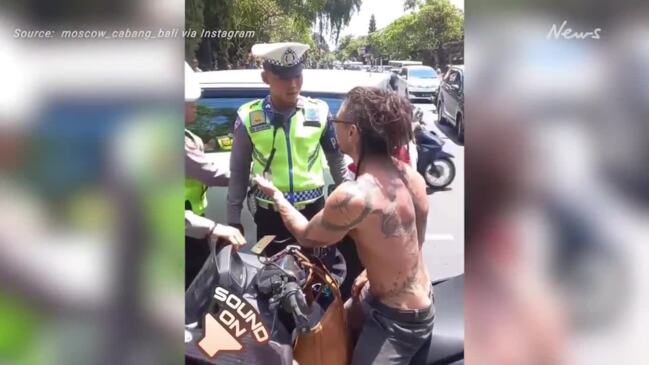 Bali police crack down on tourist with no helmet