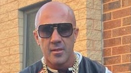 Hells Angels boss Luke Moloney is accused of carrying out a kidnapping and home invasion.