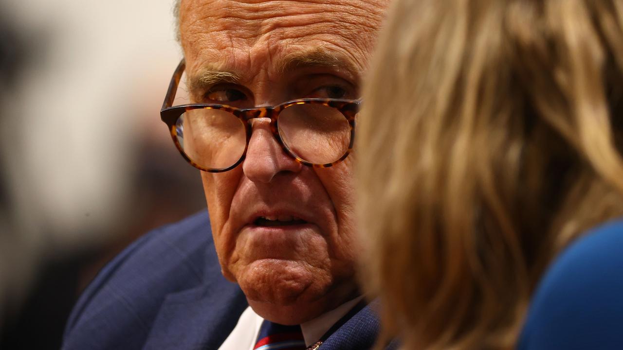 Rudy Giuliani consulting with his colleague Jenna Ellis during a hearing in Michigan last week. Picture: Rey Del Rio/Getty Images/AFP