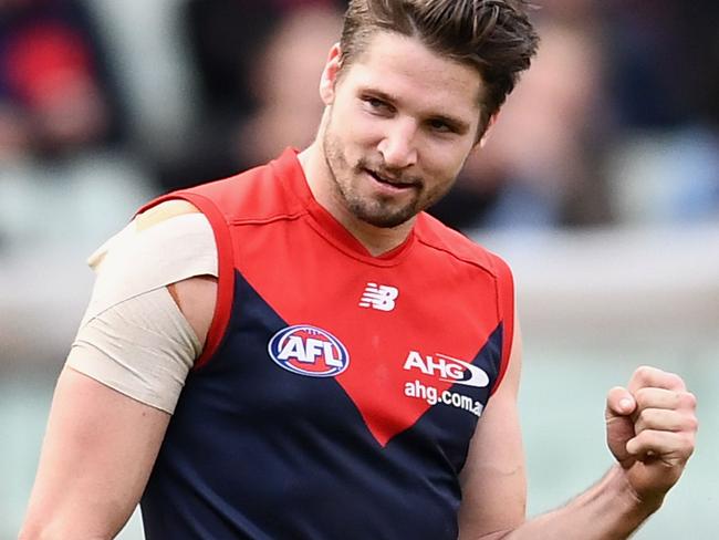 MELBOURNE, AUSTRALIA - AUGUST 20:  Jesse Hogan of the Demons celebrates winning the round 22 AFL match between the Melbourne Demons and the Brisbane Lions at Melbourne Cricket Ground on August 20, 2017 in Melbourne, Australia.  (Photo by Quinn Rooney/Getty Images)