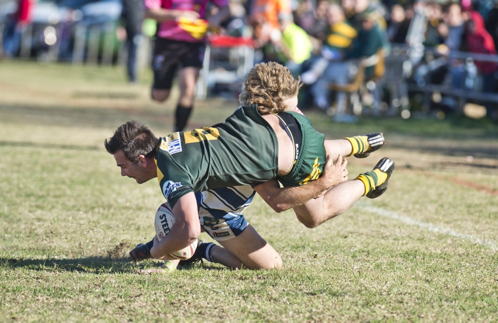 Jaren Bender, Brothers tackles Braydon Wilson, Wattles. TRL, Wattles vs Brothers. Sunday, 8th Jul, 2018. Picture: Nev Madsen