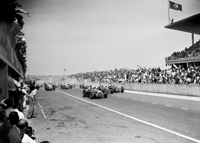 Alfa Romeo driver Juan Manuel Fangio leads the 1950 French Grand Prix on his way to victory at Reims