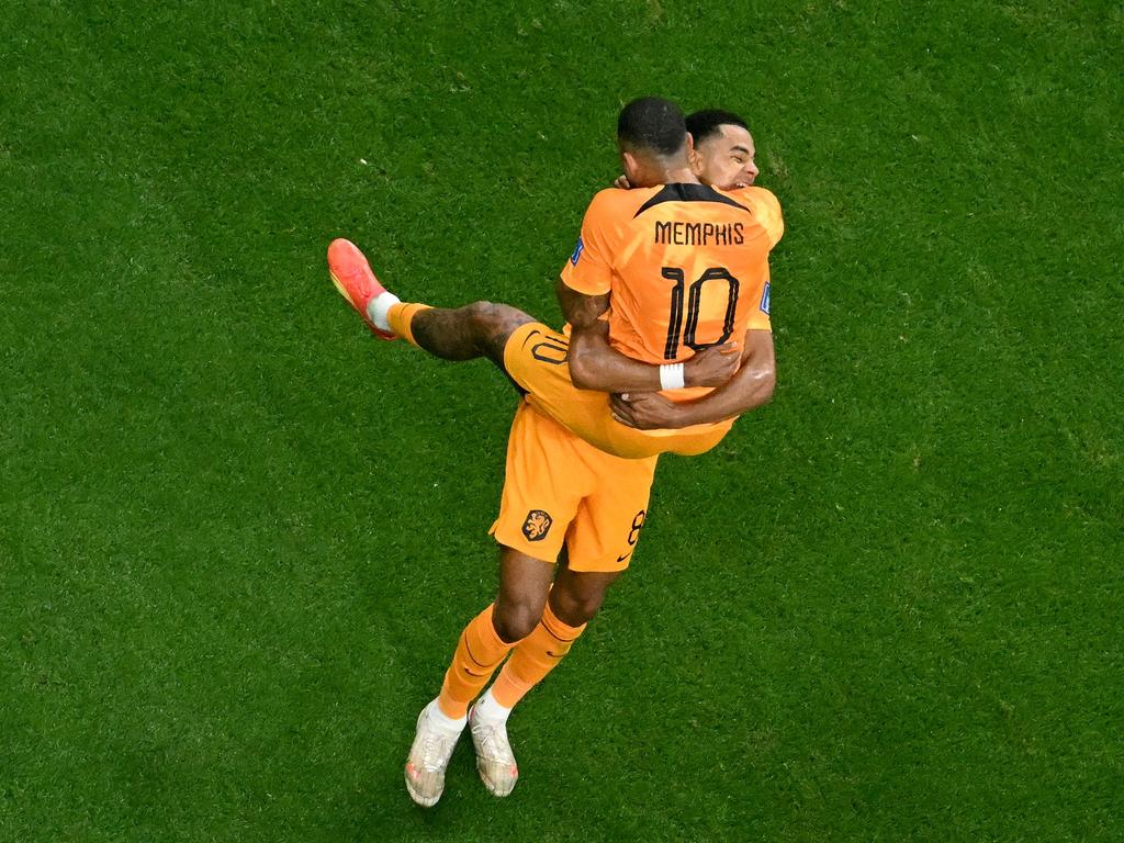 Netherlands' forward #08 Cody Gakpo celebrates his goal with Memphis Depay. Picture: Francois-Xavier Marit/AFP