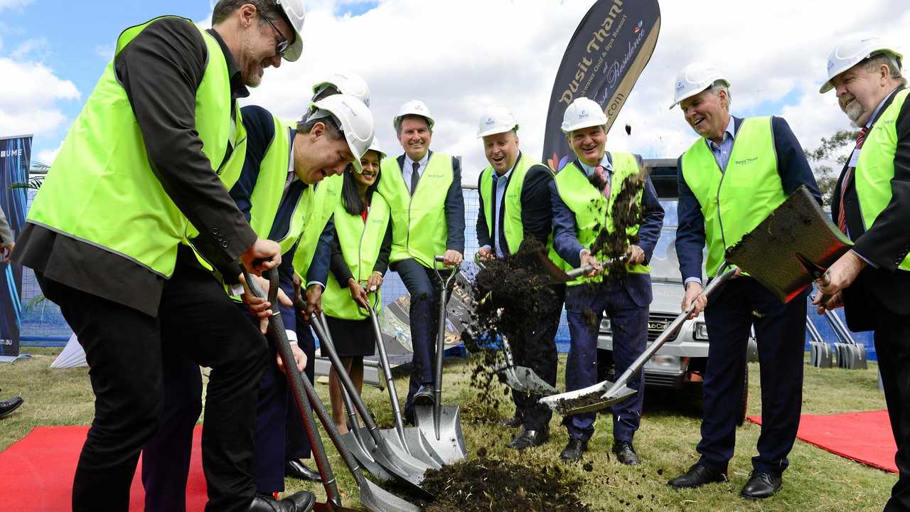 Officials turn the first sod at Dusit Thani Brookwater Golf and Spa Resort. Picture: David Nielsen