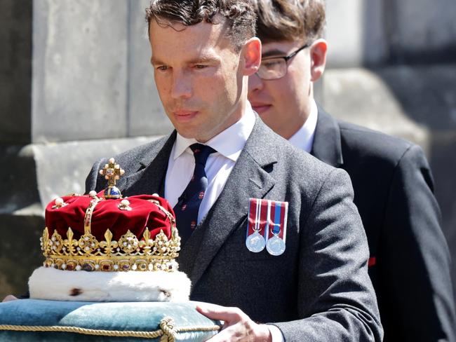 The Scottish Crown jewels being carried to King Charles. (Photo by Chris Jackson – WPA Pool/Getty Images)