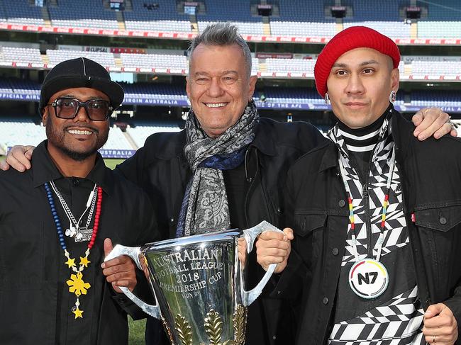 MELBOURNE, AUSTRALIA - SEPTEMBER 27:  apl.de.ap and Taboo of The Black Eyed Peas along with Jimmy Barnes pose with the 2018 AFL Premiership Cup during the AFL Pre-Match Entertainment Press Conference at Melbourne Cricket Ground on September 27, 2018 in Melbourne, Australia.  (Photo by Scott Barbour/AFL Media/Getty Images)