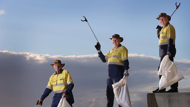 Gold Coast City Council cleaners at work in Surfers Paradise. Picture Glenn Hampson