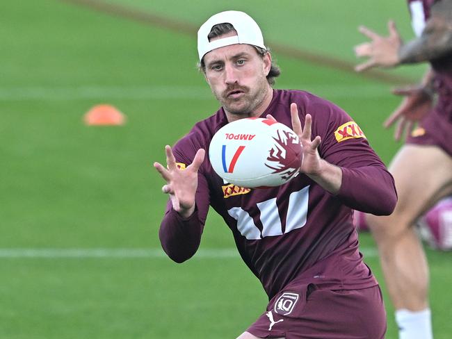 SUNSHINE COAST, AUSTRALIA - MAY 21: Cameron Munster in action during a Queensland Maroons State Of Origin training session at Sunshine Coast Stadium on May 21, 2025 in Sunshine Coast, Australia. (Photo by Bradley Kanaris/Getty Images)
