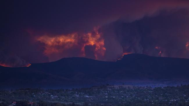 Authorities are warning the blaze is the most serious Canberra has faced since the deadly 2003 fires. The fire had burnt through 8000 hectares on Tuesday night. Picture: Gary Ramage