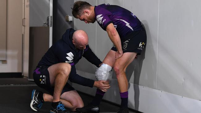 Cameron Munster of the Storm has his knee strapped during the NRL Qualifying Final match between the Melbourne Storm and the Parramatta Eels.