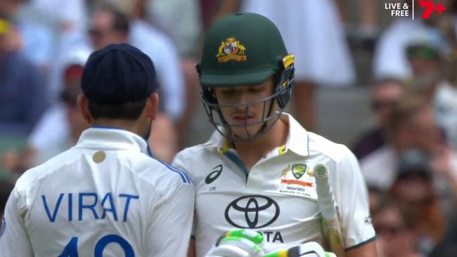 Virat Kohli bumps Sam Konstas with his shoulder bump at the MCG. Picture: Channel 7