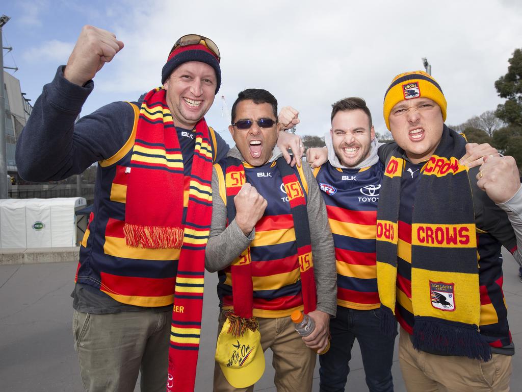 Crows fans start flocking to the MCG. L-R Marty Davidson, Somesh Dumra, Kieran Davidson and Anthony Hancock. Picture: Sarah Matray