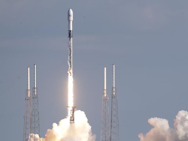 A Falcon 9 SpaceX rocket with a payload of approximately 60 satellites for SpaceX's Starlink broadband network lifts off from Space Launch Complex 40 at the Cape Canaveral Air Force Station in Cape Canaveral, Fla., Wednesday, Jan. 29, 2020. (AP Photo/John Raoux)