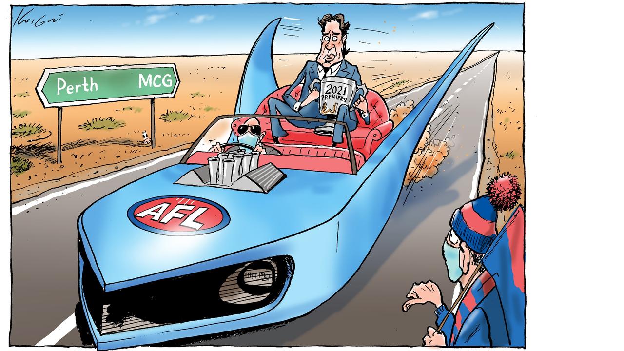 AFL chief executive Gillon McLachlan holds the 2021 premiership cup as he heads west in the batmobile in Mark Knight’s cartoon.