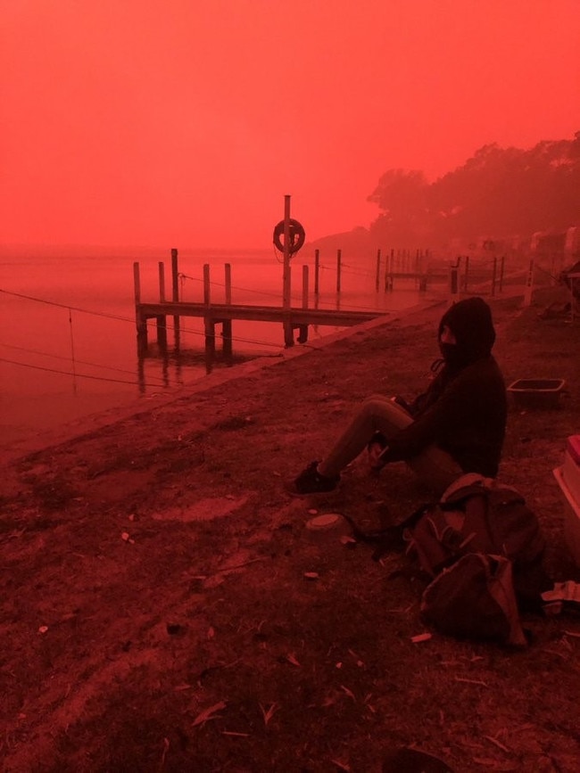 Thousands of people are sheltering from the firestorm on the wharf in Mallacoota. Picture: Twitter/Aileen Brown@ail_brown