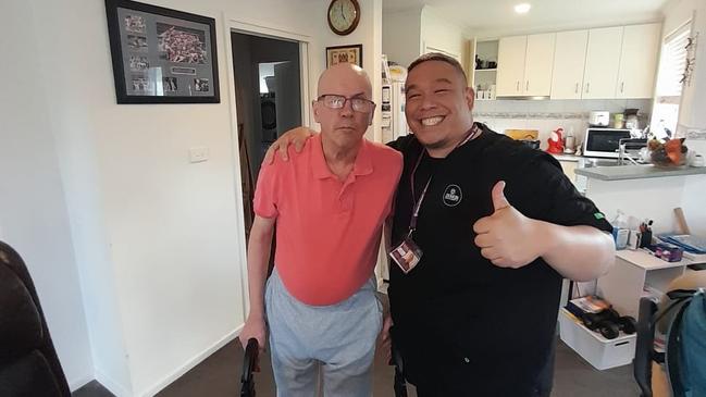 Home care support worker from the Philippines Gary Fanlo (right) will be spending Christmas Day with his client Peter Wishart (left). Picture: Supplied